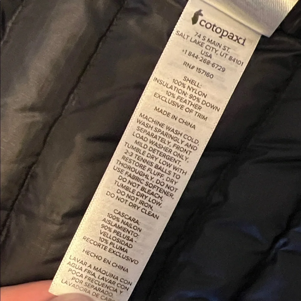 Cotopaxi Black and Blue Puffer Vest with Green Stripe - Picture 6 of 6